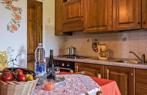 Lajatico Villa | Lovely apartment in villa for 2 guests with WIFI, pool, TV, patio and parking