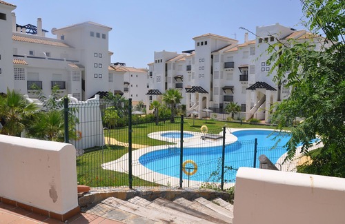 San Luis de Sabinillas Apartment | Lovely apartment with large terrace facing the pool. Walking distance to everything.
