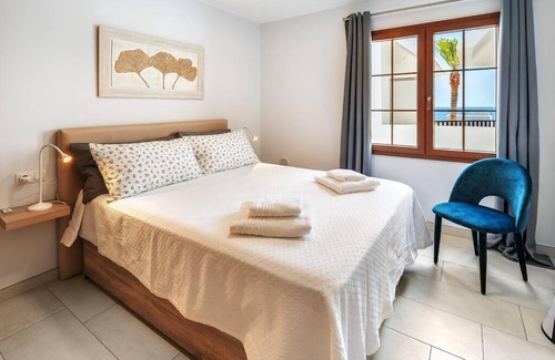 Puerto del Carmen Apartment | Lovely apartment with sea and mountain views