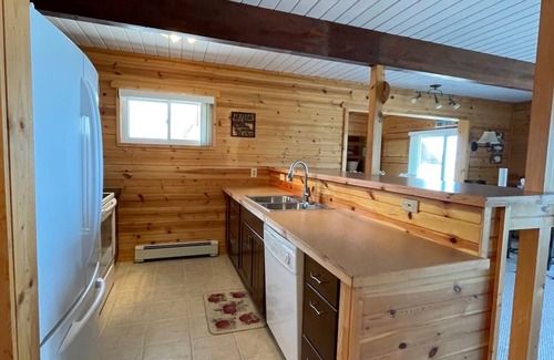 Cheboygan House | Lovely Chalet Home on Quiet Bay with Sandy Beach