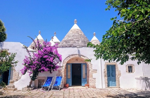 Locorotondo Villa | Lovely fully restored trullo country house, large fenced pool and wifi
