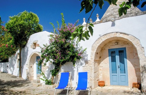 Locorotondo Villa | Lovely fully restored trullo country house, large fenced pool and wifi