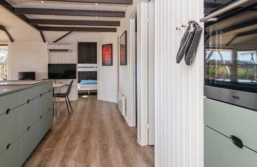 Lakolk House | Lovely Holiday Home in R m with Sauna