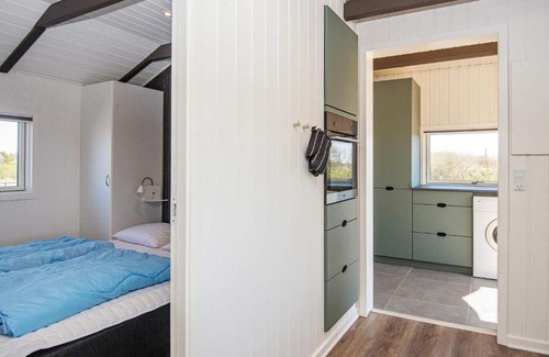 Lakolk House | Lovely Holiday Home in R m with Sauna