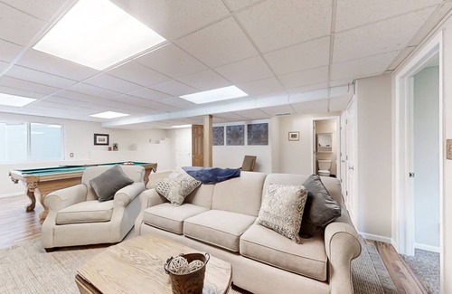 Greeley House | Lovely home with an enclosed yard, fireplace, pool table, games, W/D, & AC