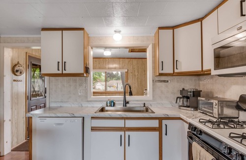 Mercer House | Lovely home with Mercer Lake view, patio, full kitchen, on trail 17