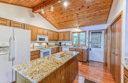 Livingston House | Lovely lakefront home with private brand-new dock, game room, beach, boat access