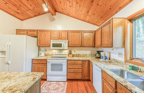 Livingston House | Lovely lakefront home with private brand-new dock, game room, beach, boat access