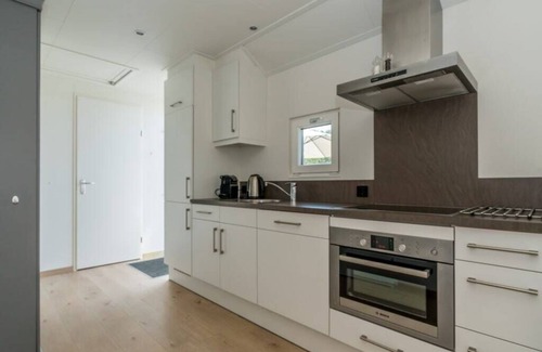 Westenschouwen House | Lovely light chalet with very spacious living room and comfortable master bedroom. A modern house eq