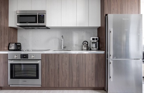 Seaport District Apartment | Lovely Seaport 1BR w/Gym, Pool, W/D, near ICA, by Blueground