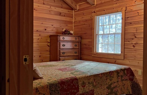 Logan Cabin | Lovie's Hillside Lodge nestled into 5 wooded acres