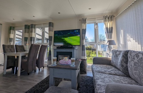 Lathum Ski Chalet | Lovingly furnished chalet centrally located in the beautiful recreation park "De Veerstal".
