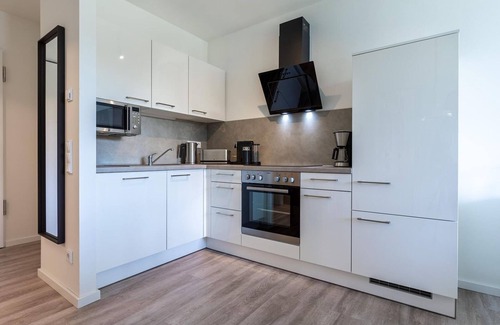 Alt-Travemunde/Ronnau Apartment | Lovingly furnished premium apartment with loggia and view of Godewindpark