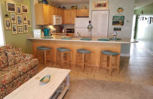 Fort Walton Beach Condo | LOWER FALL RATES! FREE BEACH SET UP! FREE WIFI! PRIME END UNIT!