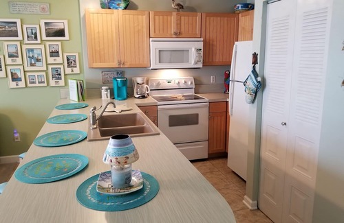 Fort Walton Beach Condo | LOWER FALL RATES! FREE BEACH SET UP! FREE WIFI! PRIME END UNIT!