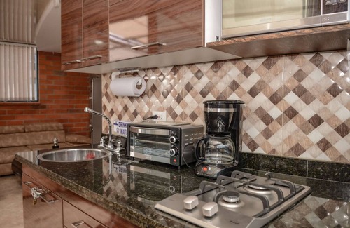 Astorga Apartment | Lower Penthouse Two Bedroom AC DECK with Hot Tub Elevator AC