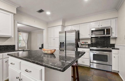 Mid City South House | LSU Garden District Bungalow—The perfect house to relax with the whole family