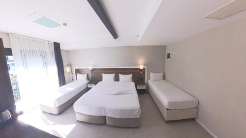 Kadnlar Denizi Mahallesi Hotel | Lulubay Rooms & Suites