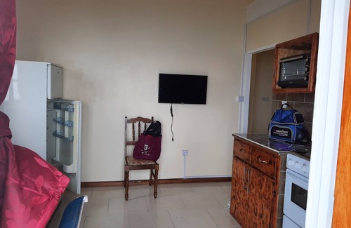 Roseau House | Lulu’s overnight home with beautiful mountain and sea view.