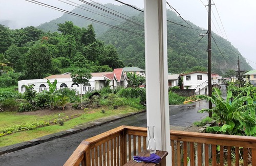 Roseau House | Lulu’s overnight home with beautiful mountain and sea view.