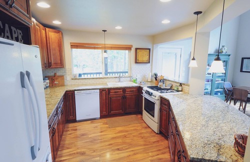 Ardenvoir House | Luxe family and pet friendly chalet in private, forested setting
