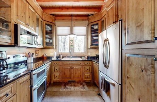 Highlands House | Luxe home overlooking Blue Valley & a stream with elevator & designer interior