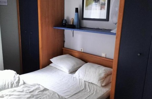 Blankenberge Apartment | luxe hotelkamer rechtstreeks aan de boulevard en zee 4pers