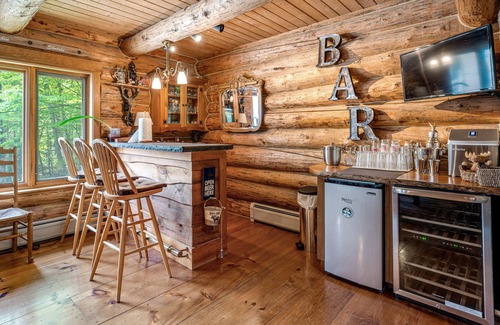 Stratton and Bromley Ski Areas House | Luxe log home with private hot tub, pool table & outdoor kitchen - dog-friendly