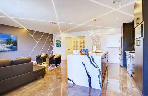 Ives Estates Villa | Luxe Tropical Paradise w Cinema, Kids Playground, Pool, BBQ, 9 Beds