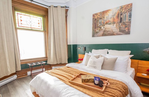 Saint John House | Luxe Turn-Of-The-Century Suite by Reversing Falls