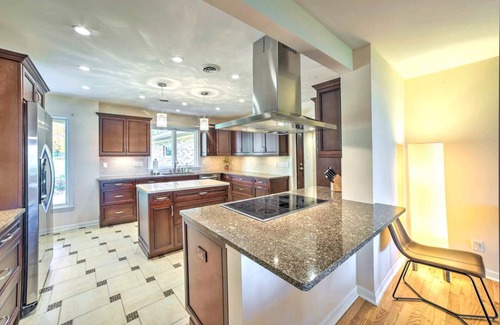Riverside House | Luxe Waterfront Haven: Private Beach, Hot Tub