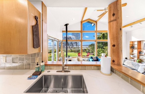 Bellingham House | Luxe Waterfront Haven: 3BR Vaulted-Ceiling Home w/Scenic Ocean & Sunset Views
