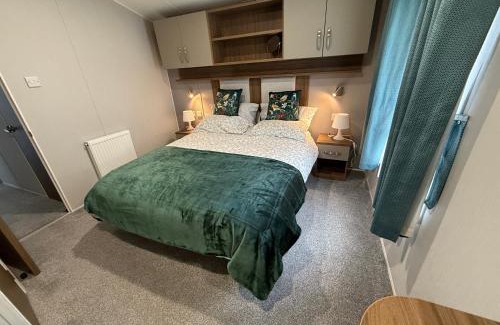 Tattershall Apartment | LuxeHaven - A Beautiful Luxury Hot Tub Caravan Holiday Home in prime location at Tattershall Lakes Country Park, Lincolnshire, with free WiFi and Cinematic Lights