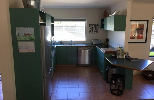 Wharewaka House | Luxury beds, Spa Pool, Bikes, Kayak, Paddle board, Trampoline
