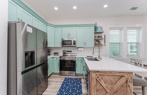 Waterside Village House | Luxurious House on the Canal, Pool, Hot Tub, steps to BEACH