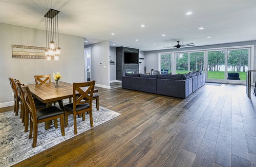 Louisa House | Luxurious lakeside home with private dock, beach, patio, & game room - dogs OK