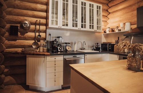 Dalby Huse House | Luxurious log house near water and forest