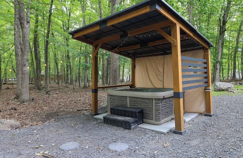 East Stroudsburg House | Luxurious Poconos Retreat~Hot Tub, Sauna, Games, Fire Pit, Pets Welcome!