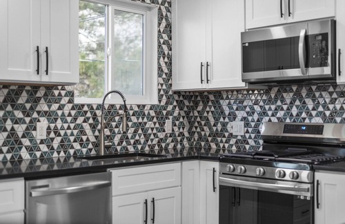 Sandy House | Luxurious Renovated Home with New Hot Tub: By Stadium, Expo Center, and Skiing.