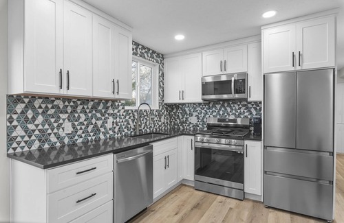 Sandy House | Luxurious Renovated Home with New Hot Tub: By Stadium, Expo Center, and Skiing.
