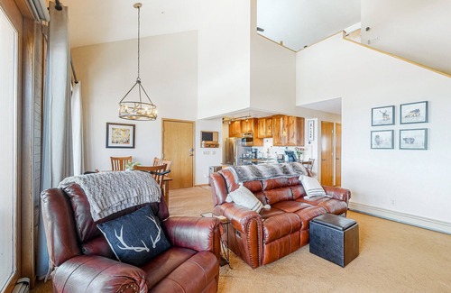 Wildernest Condo | Luxurious top-floor condo with balcony, WiFi, fireplace, great views, & location