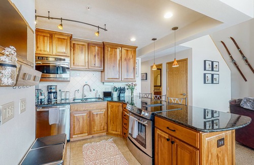 Wildernest Condo | Luxurious top-floor condo with balcony, WiFi, fireplace, great views, & location