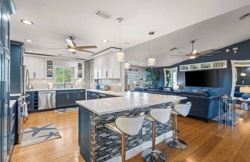 Saint James City House | Luxurious waterfront home, pool, boat dock, fillet station, private guest suite