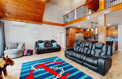 Boothbay House | Luxurious waterfront home with deck, firepit, hot tub, fireplace, & pool table