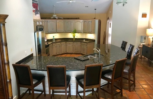 Palm City House | Luxurious Waterfront Home, ocean access, dock, pool, and spa