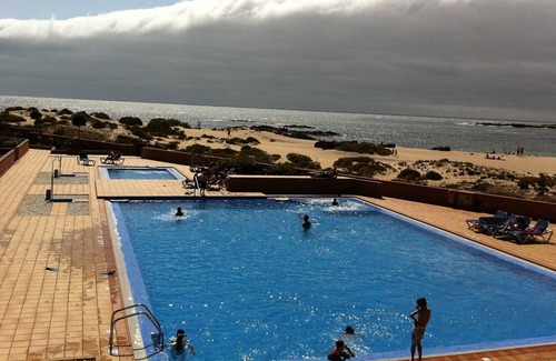 Los Lagos Apartment | Luxuriously furnished apartment first row on the sandy beach of Los Lagos + WiFi
