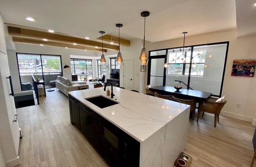 Channel District Condo | Luxury 1 Bedroom Channelside Condo Private Walk Up Garage 4 mins to Amelia Arena