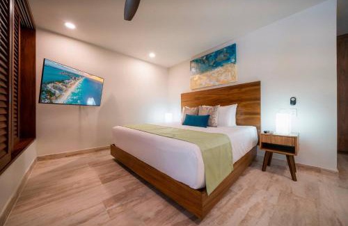 Playacar House | Luxury 2 Bedroom Condo - Infinity Pool at AWA Residences in Playacar, AWA 107