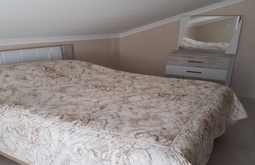 Gulluk Apartment | Luxury 2 storey apartment in Gulluk, Turkey with a sea view