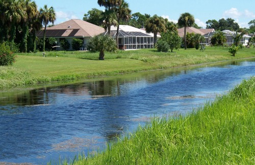 Long Meadow Villa | Luxury 3 bedroom 2 with heated pool and canal view